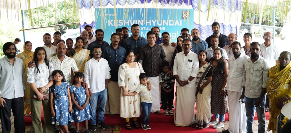 Keshvin Hyundai Delivers 25 Cars on Chingam 1 MP Hibi Eden with families who received their cars at the Keshvin Hyundai delivery ceremony in Kochi. CEO Sanjulal Ravindran and GM Danish P. Davis are also seen