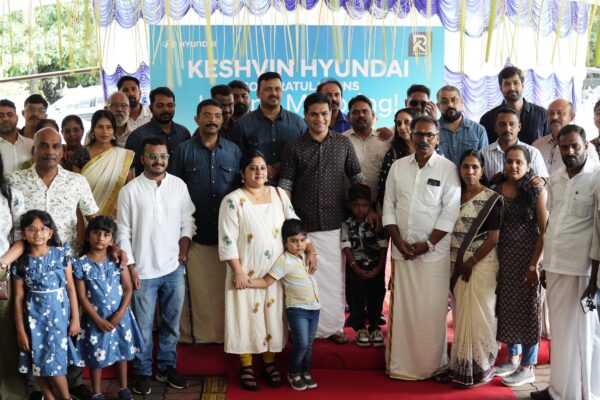 Keshvin Hyundai Delivers 25 Cars on Chingam 1 MP Hibi Eden with families who received their cars at the Keshvin Hyundai delivery ceremony in Kochi. CEO Sanjulal Ravindran and GM Danish P. Davis are also seen